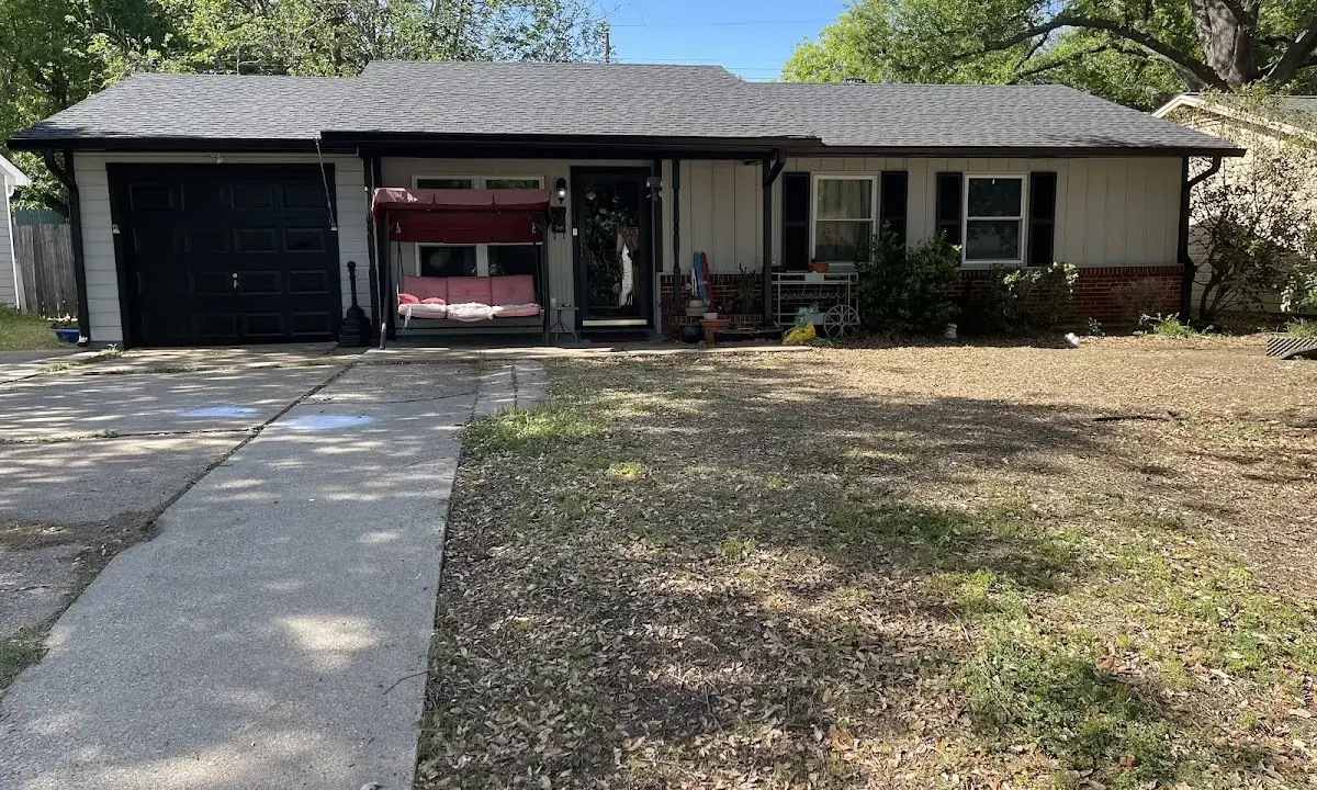 Metal Roof Installation crew at work on a residential roof in Opelousas